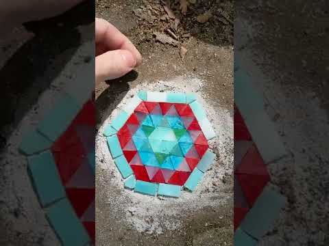 I repaired a hole in the sidewalk with mosaic tiles.